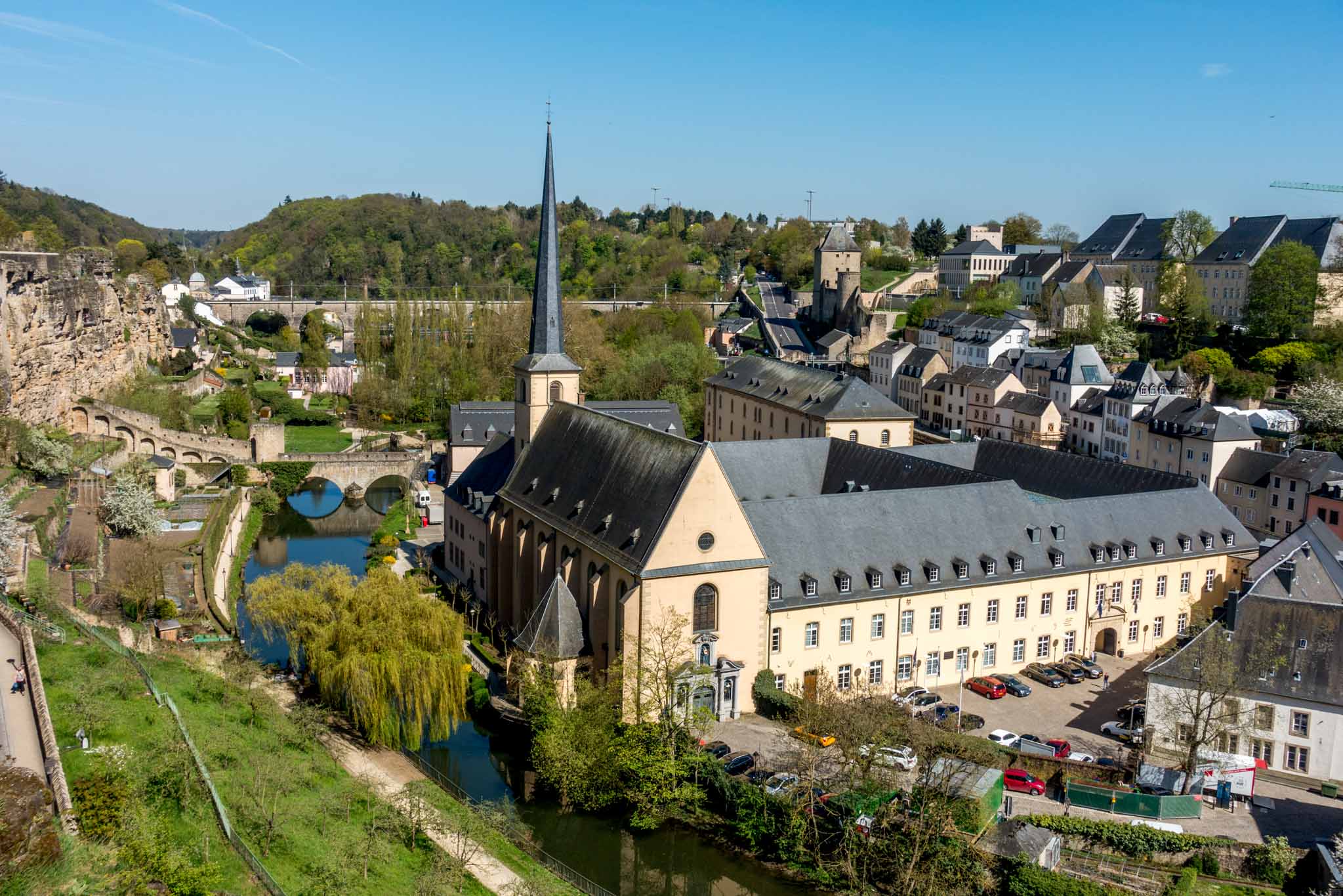 View of church and buildings in river valley in Luxembourg City