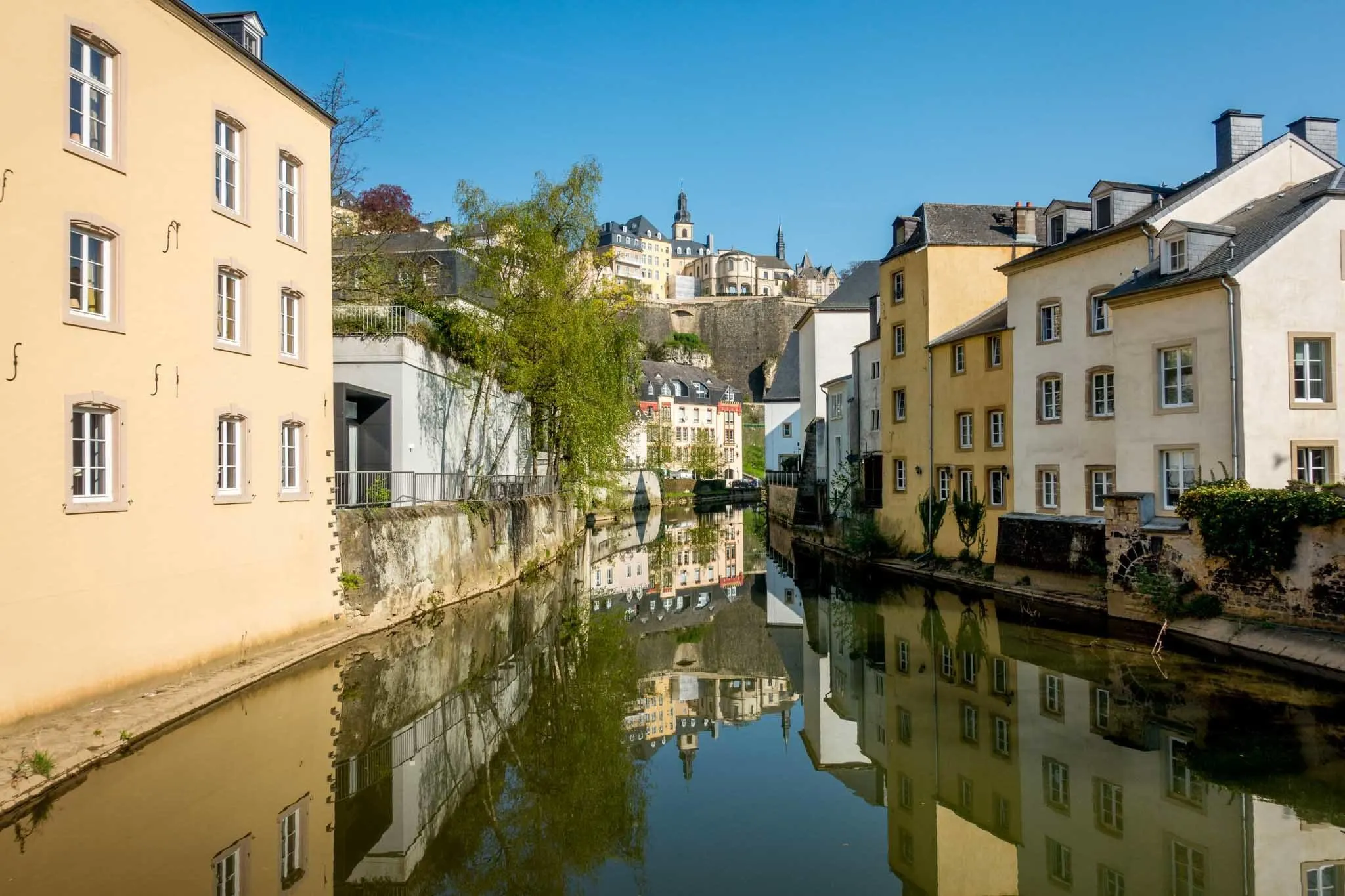 River lined with buildings.