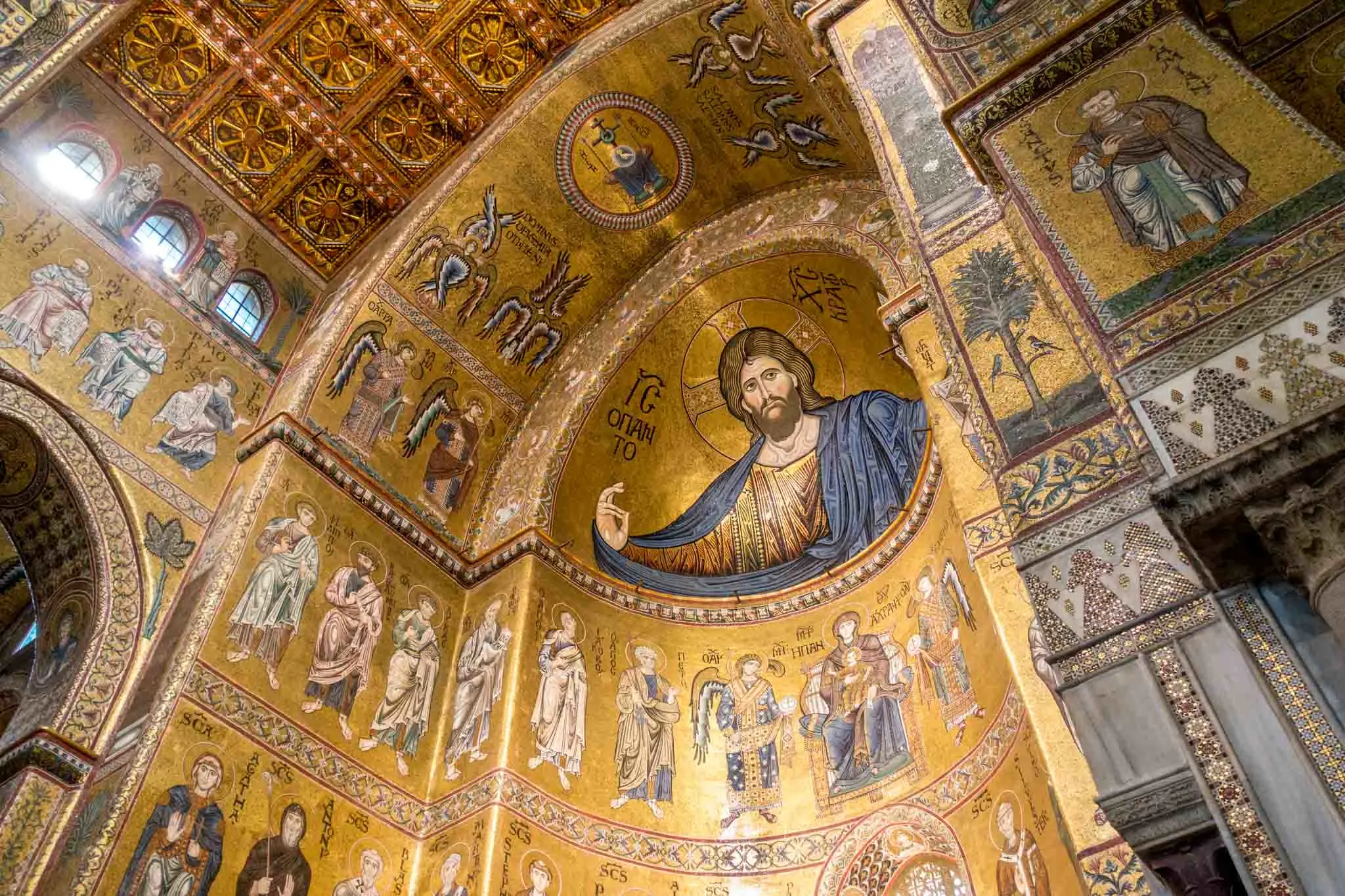 Massive mosaic inside a cathedral showing Jesus and other figures