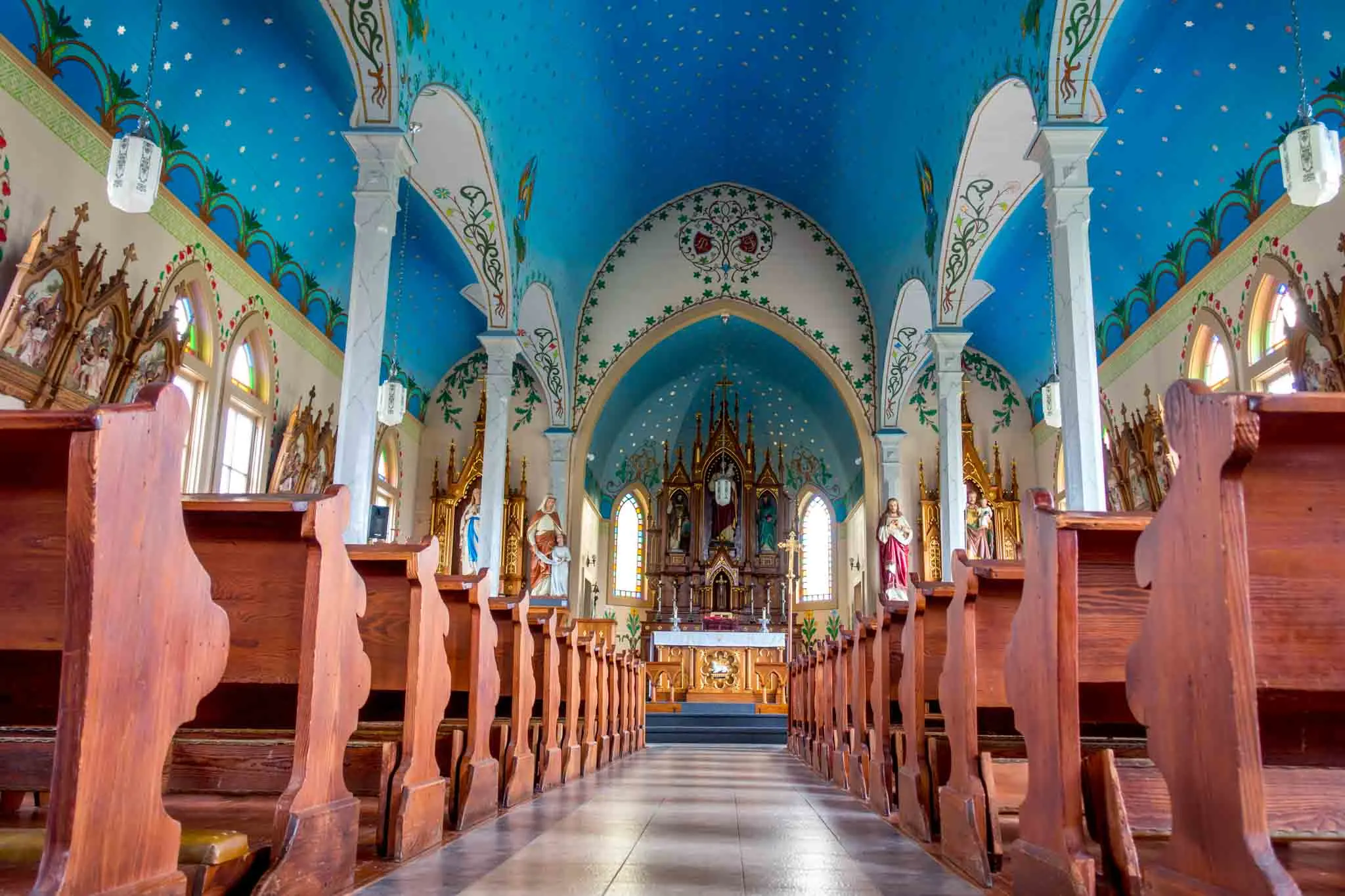 Church interior with a blue ceiling painted with stars