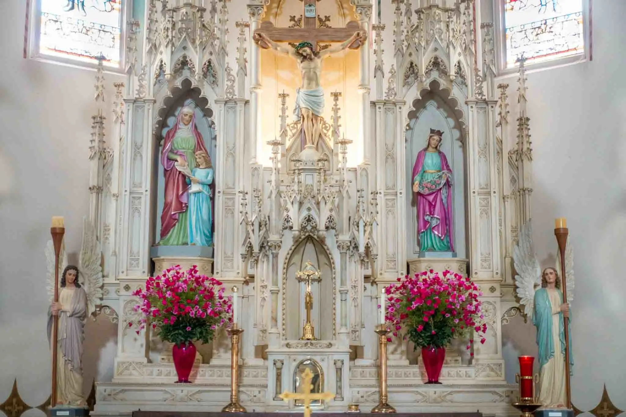 White altar with brightly-colored statues