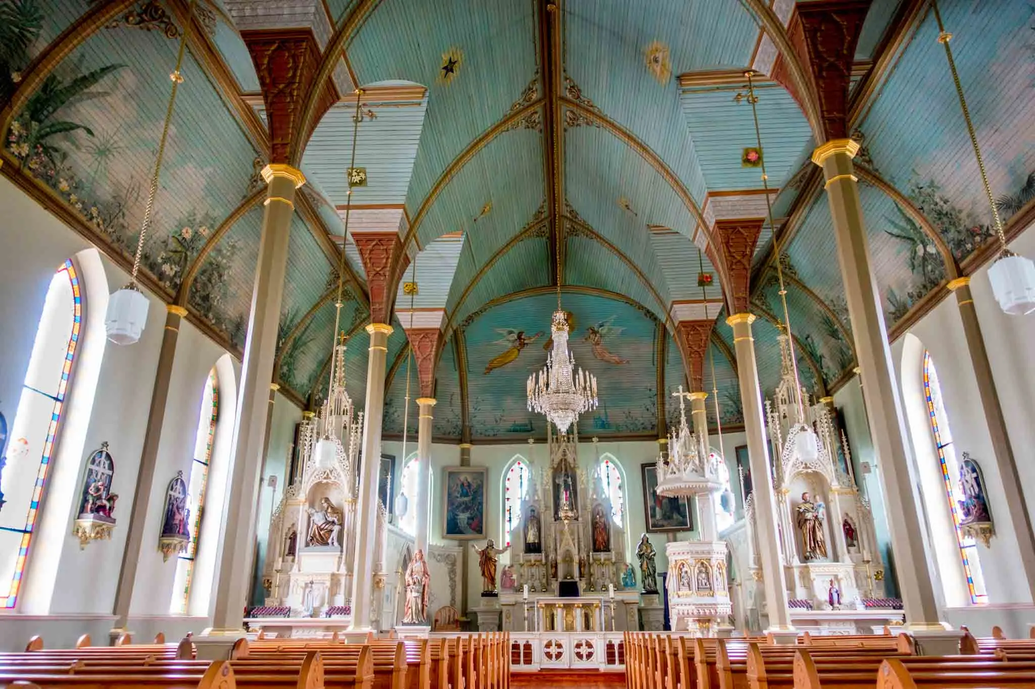Sanctuary with blue ceiling and chandeliers