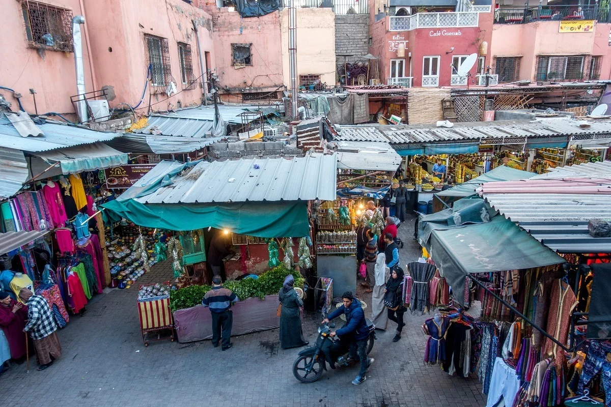 Vendors and shoppers in the street of the medina