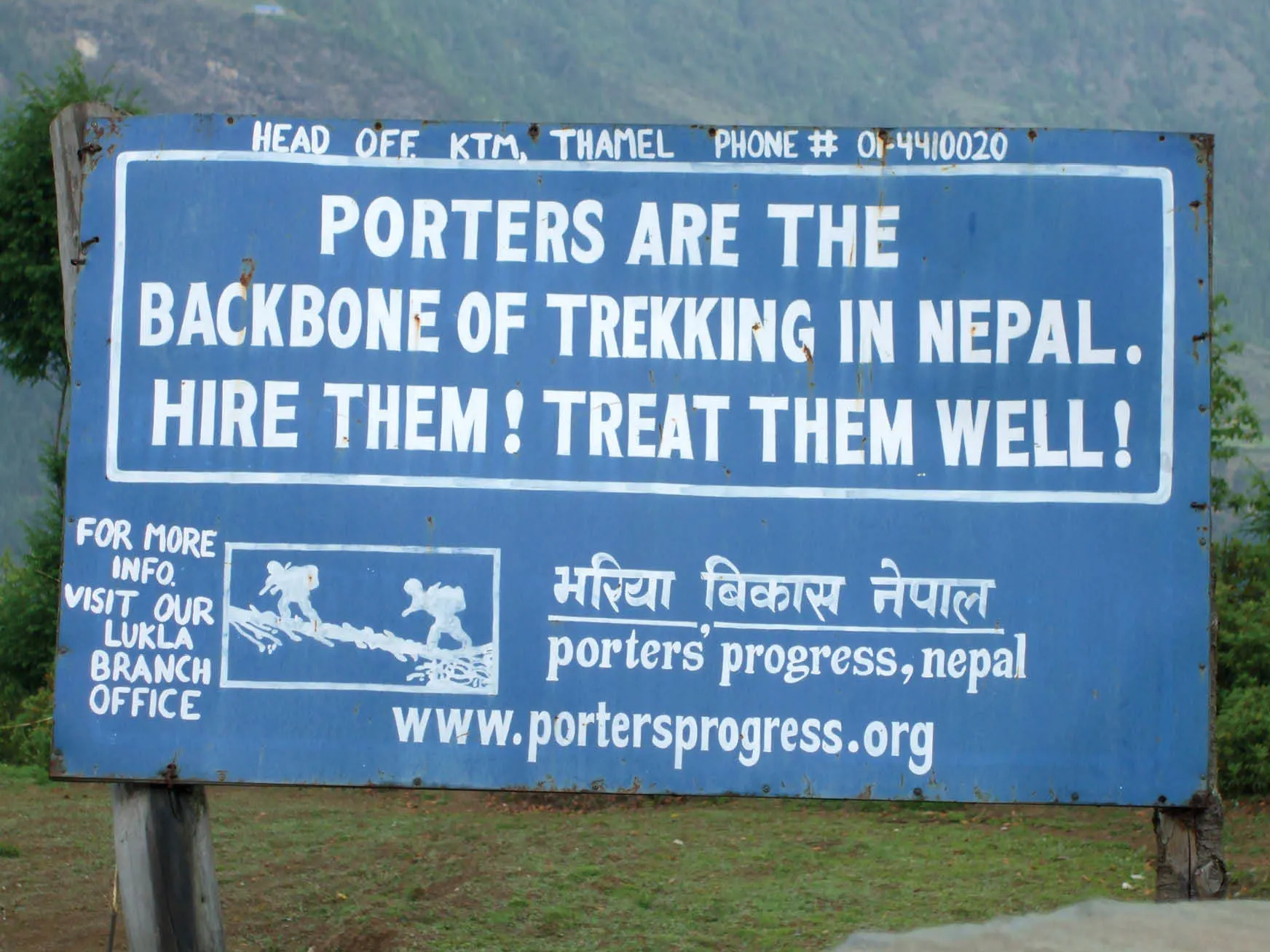 Sign for trekkers in Nepal that raises awareness of rights for sherpas and porters