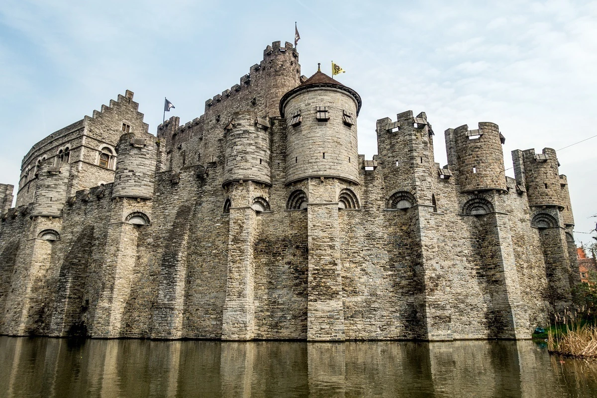 Stone exterior of Castle of the Counts above the river.