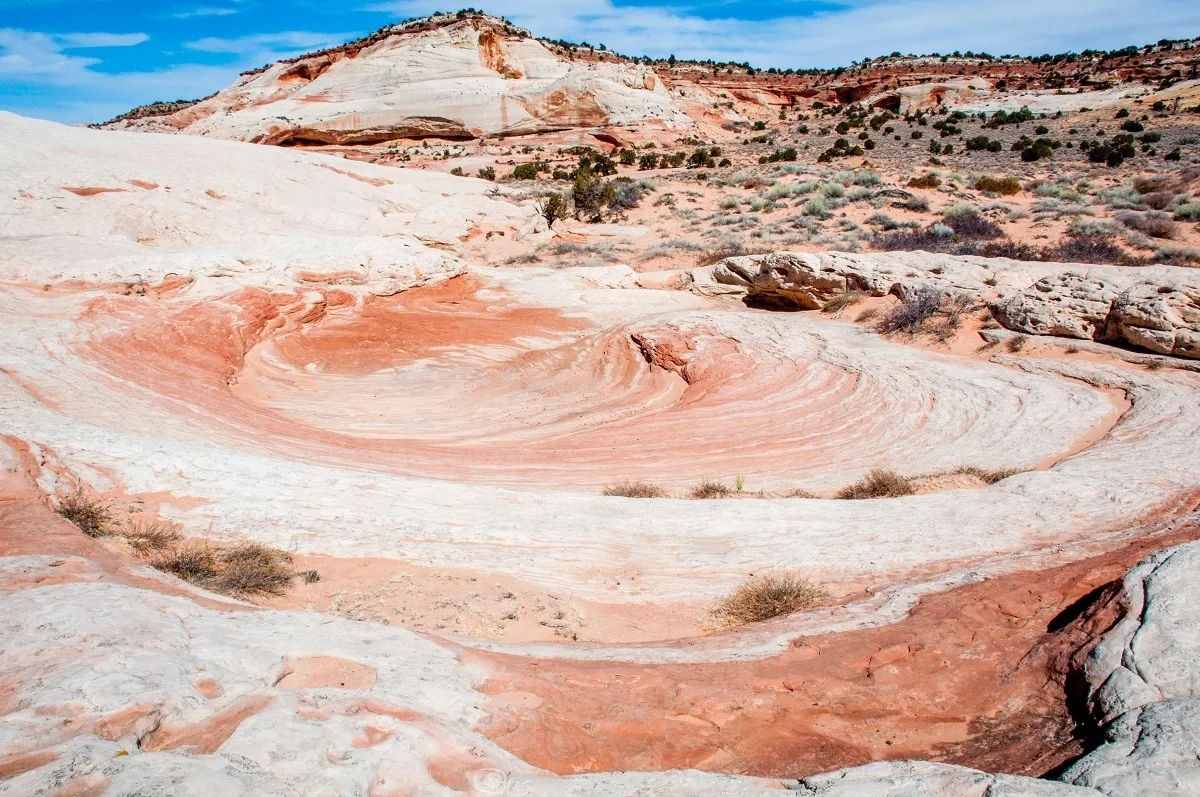 Swirling red and white rock formation