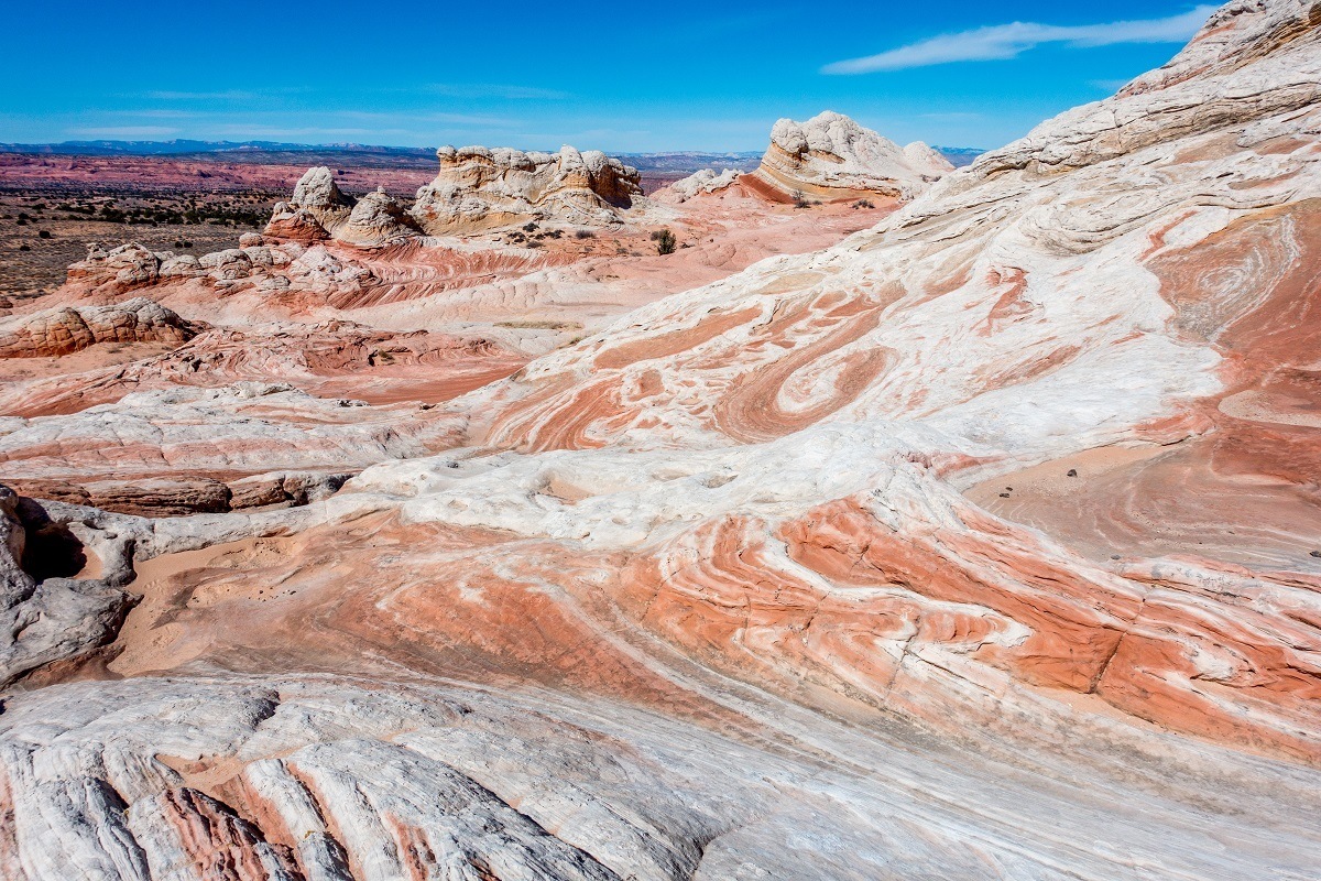 Red and white rock features at White Pocket in the Vermilion Cliffs