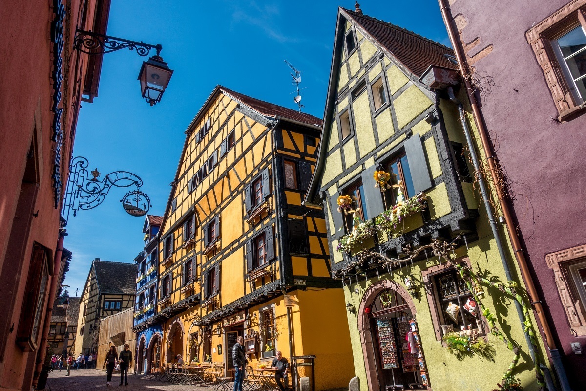 Brightly-colored half-timbered buildings in Riquewihr
