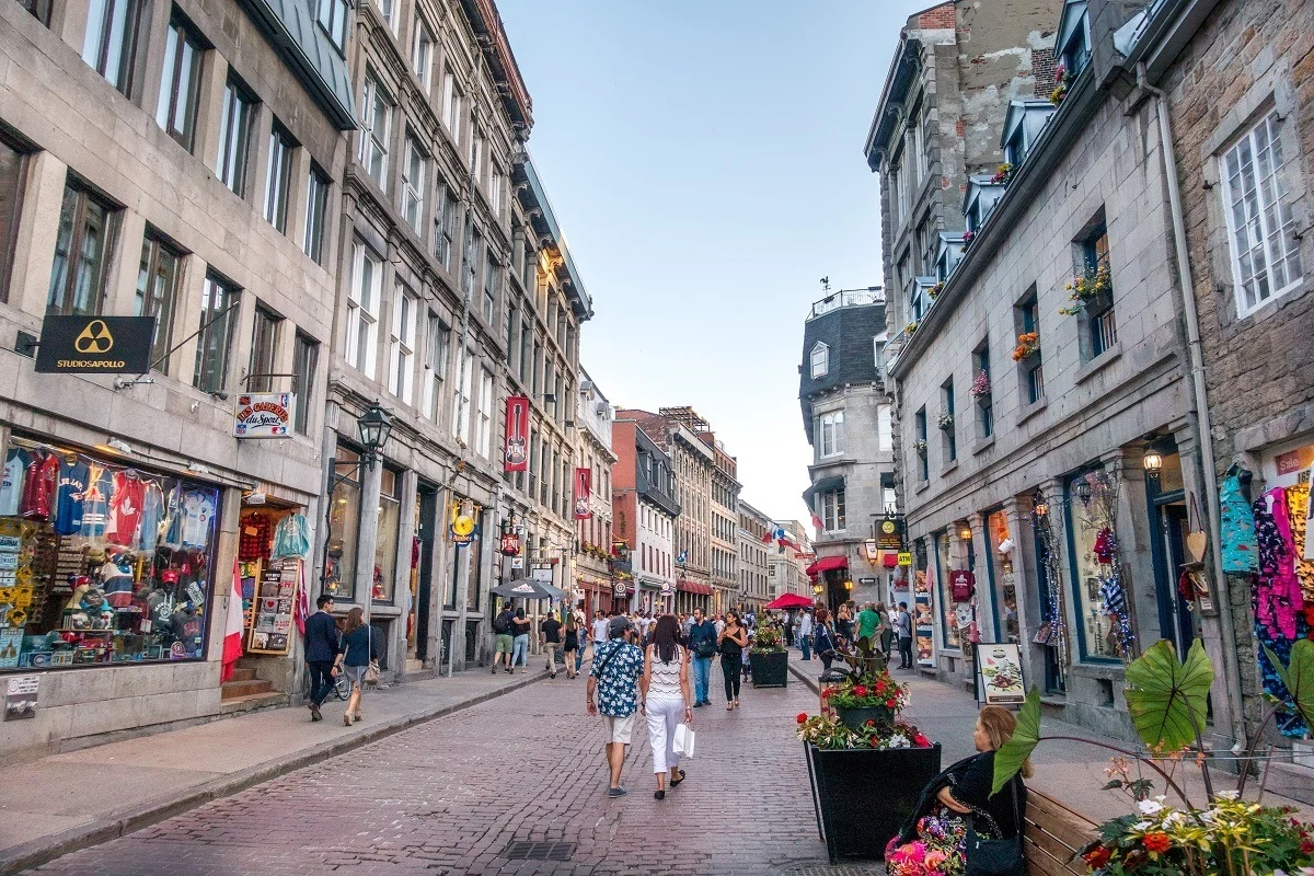 People walking by shops on Saint-Paul Street in Montreal