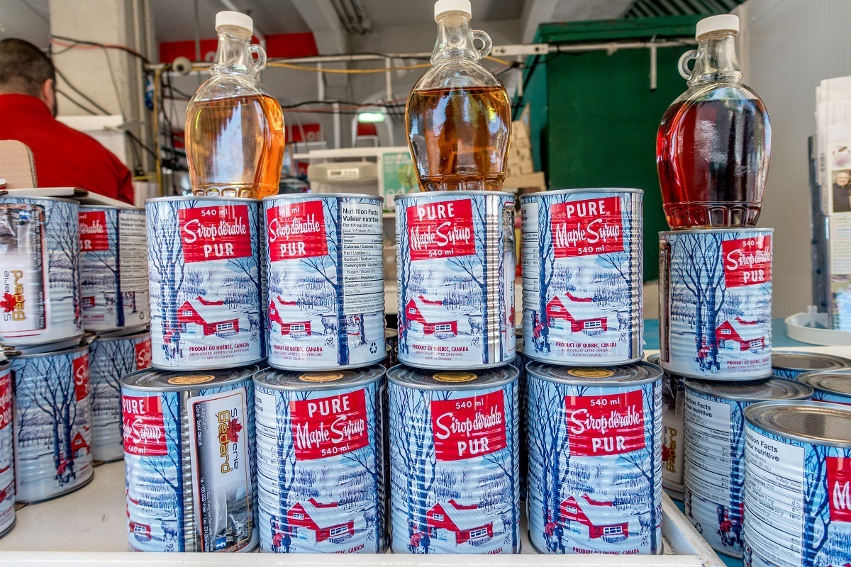 Cans of maple syrup