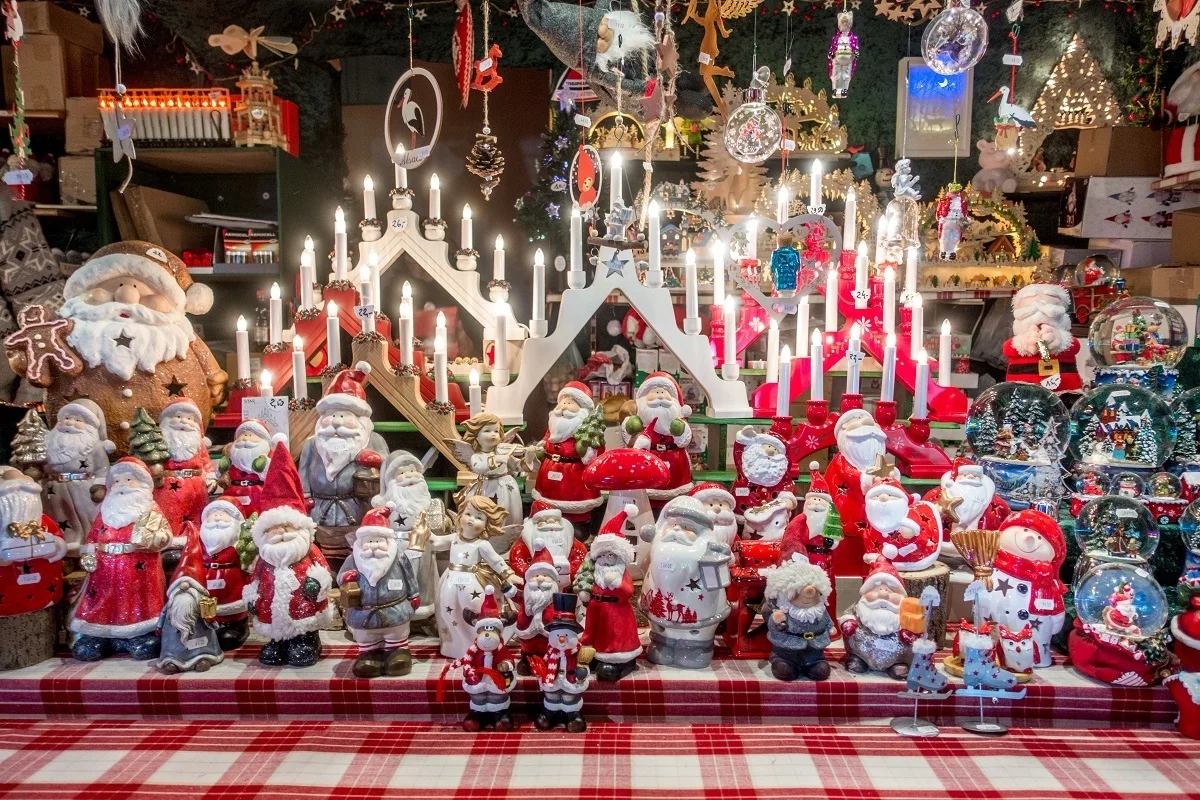 Santas, snowglobes, and decorations for sale. 