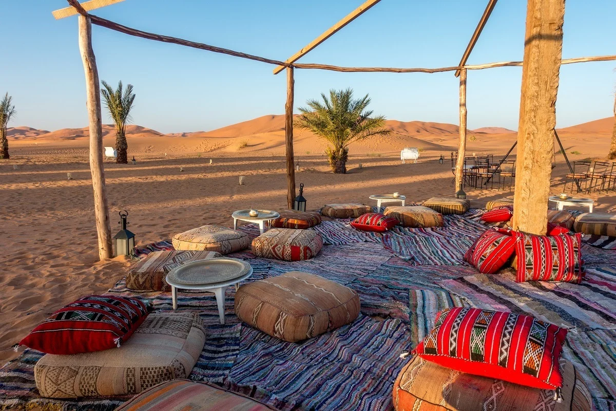 Seating area with colorful pillows in the desert