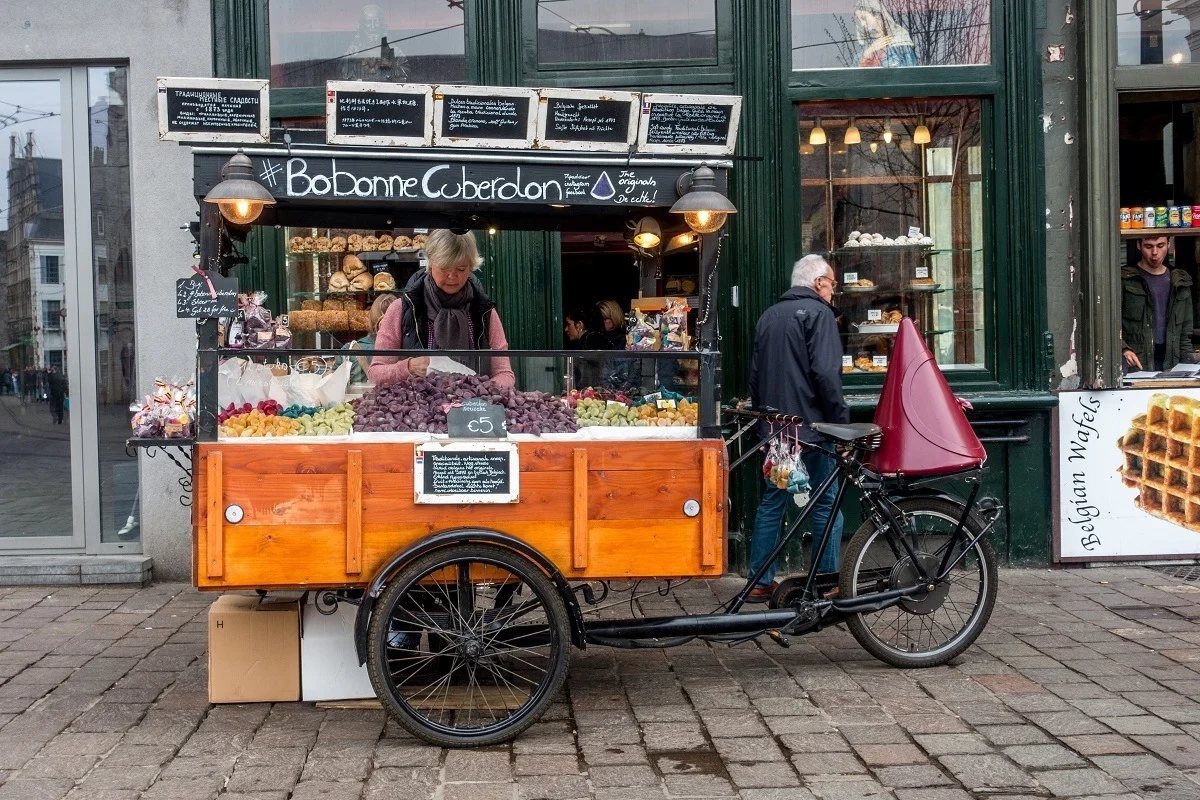 Bicycle cart selling traditional cuberdon candy at the Groentenmarkt