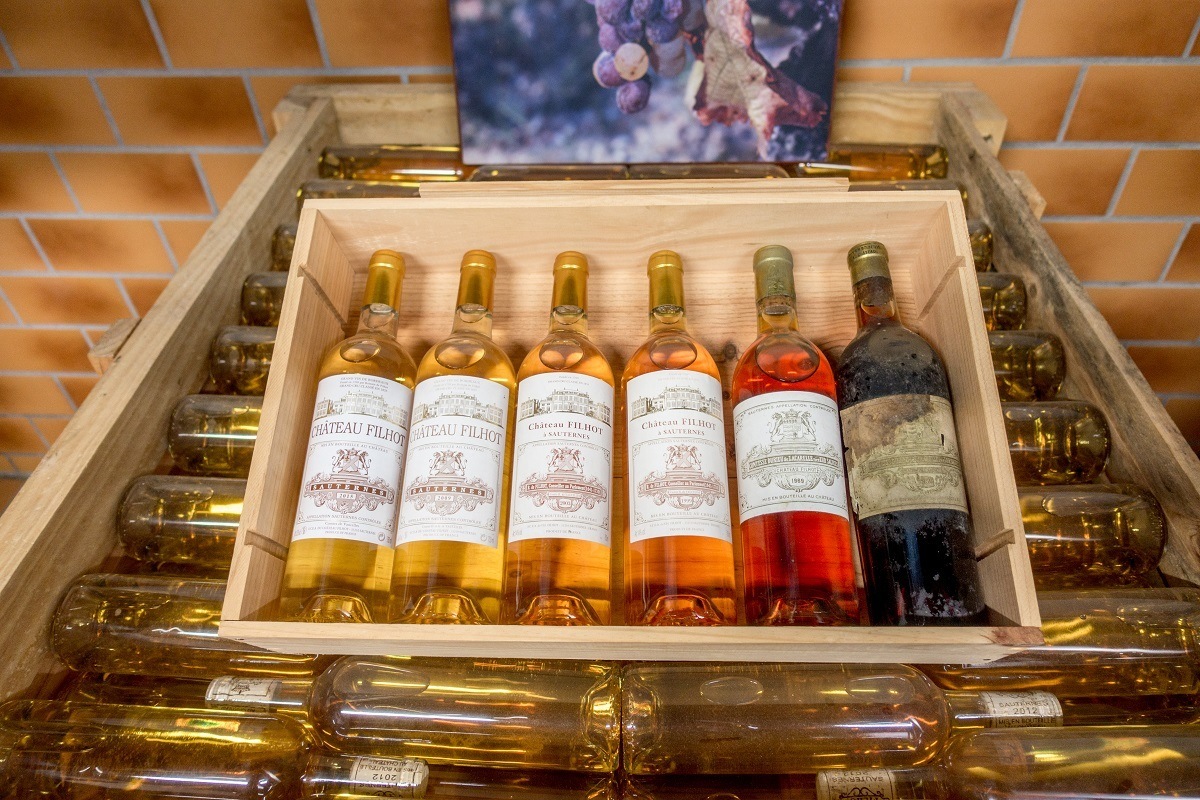 Bottles of different wines displayed in a box