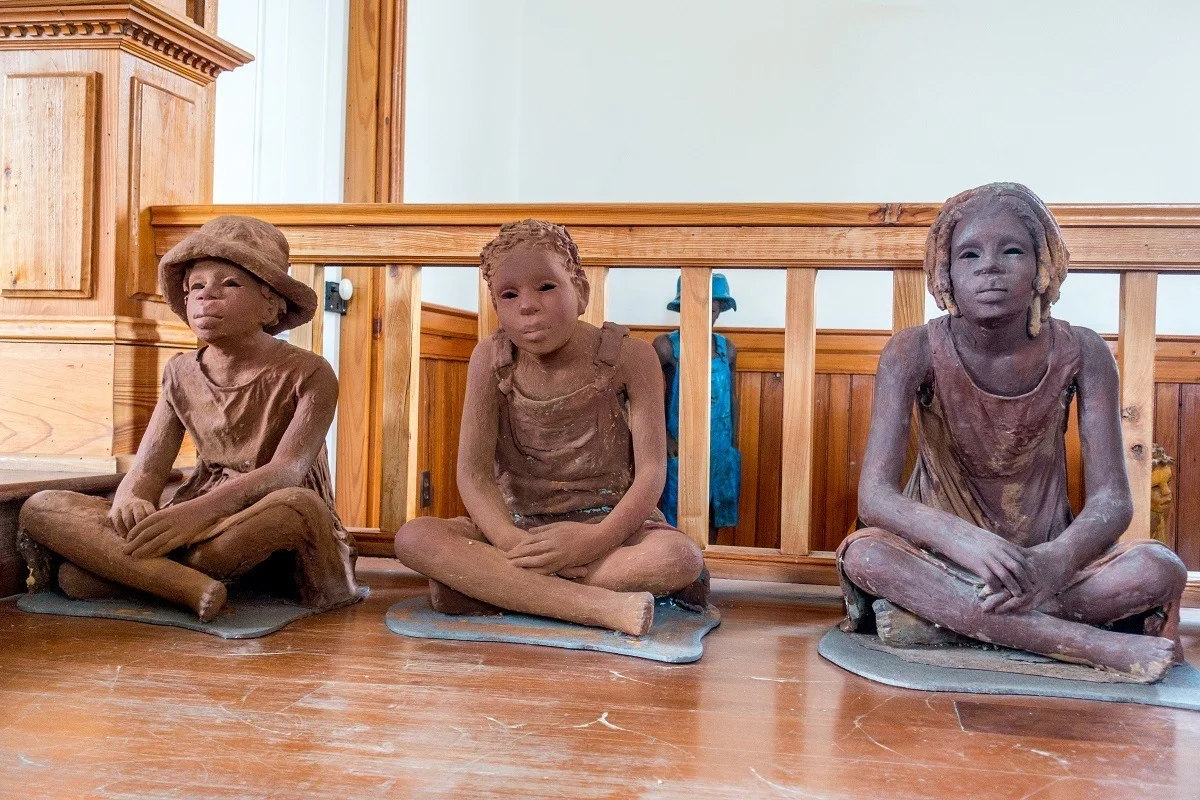 Clay statues representing child slaves 