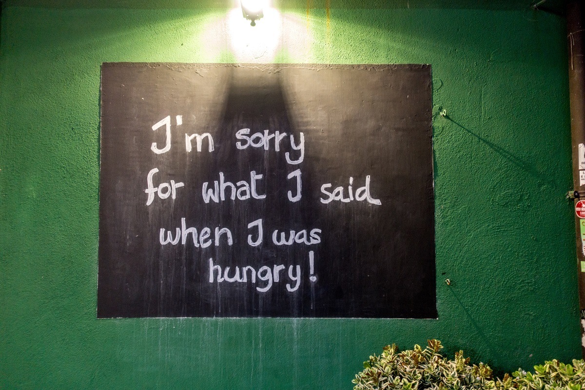 Sign saying, "I'm sorry for what I said when I was hungry"