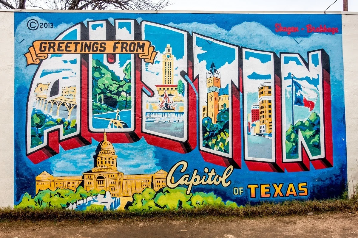 Colorful street art mural "Greetings from Austin" 