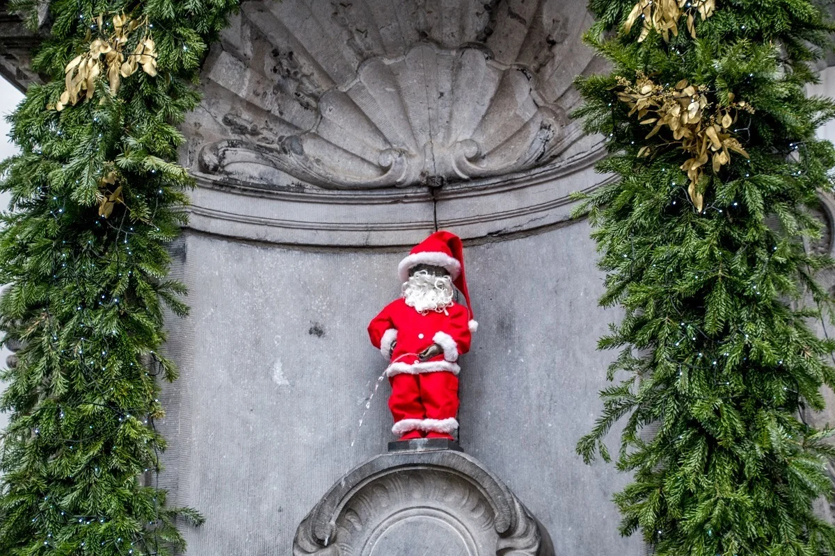 Statue of urinating boy dressed up as Santa