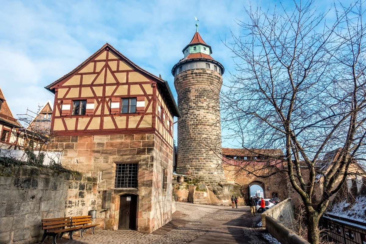 The round Sinwell Tower and the half-timbered Deep Well building in the Imperial Castle in Nuremberg