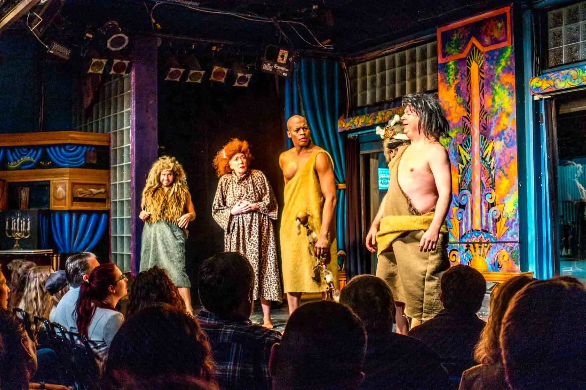 Costumed vaudeville performers on stage