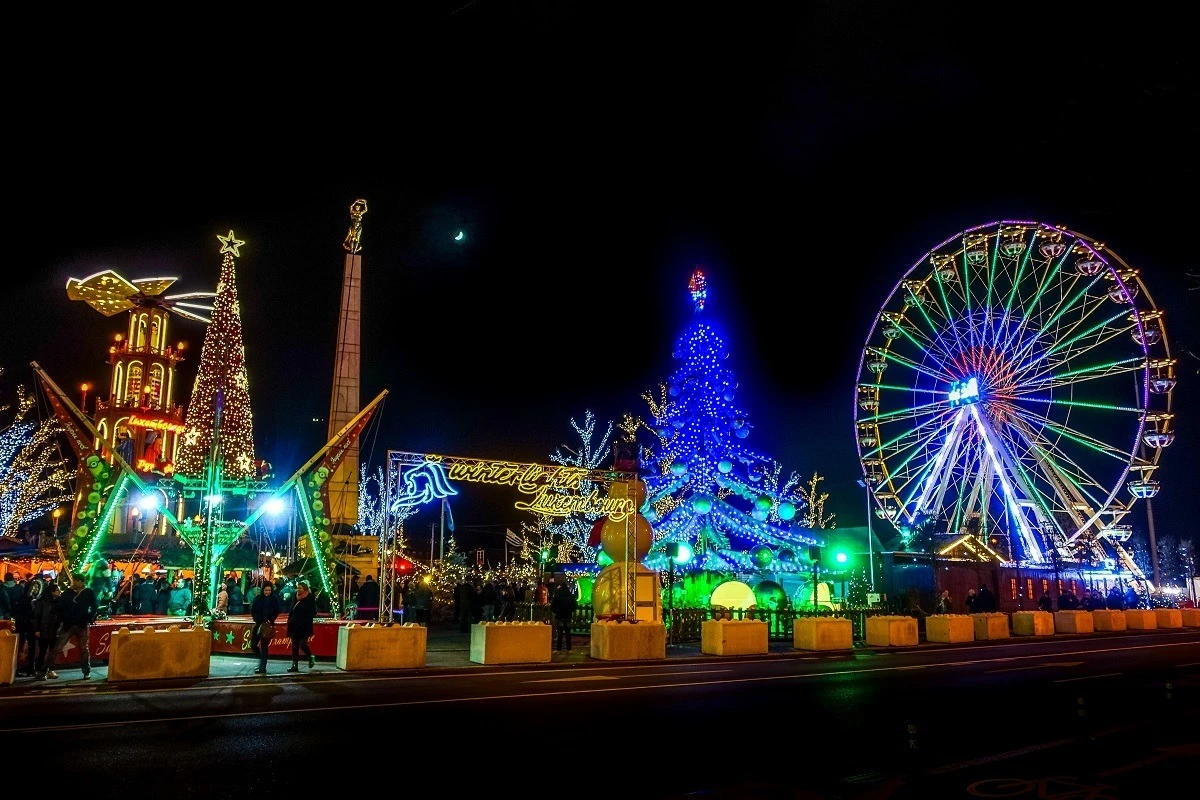 Carnival rides and Christmas lights at the Luxembourg City Christmas market.