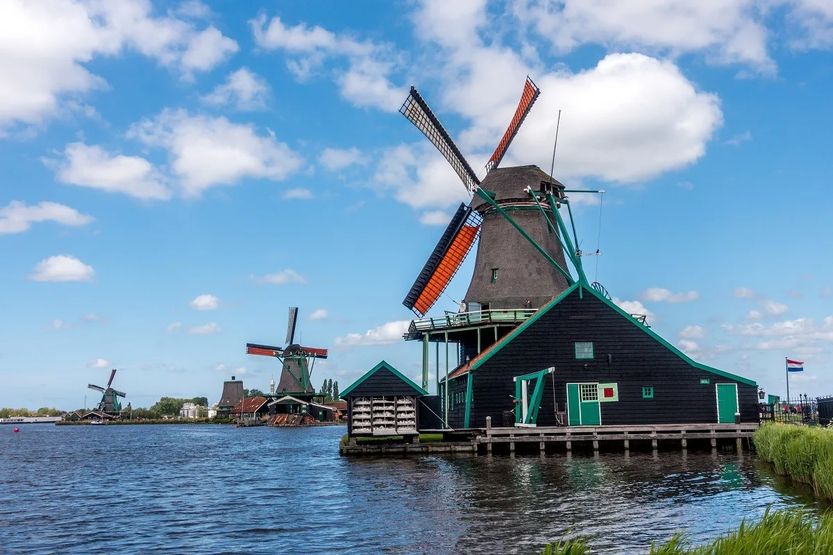 Windmills along the water