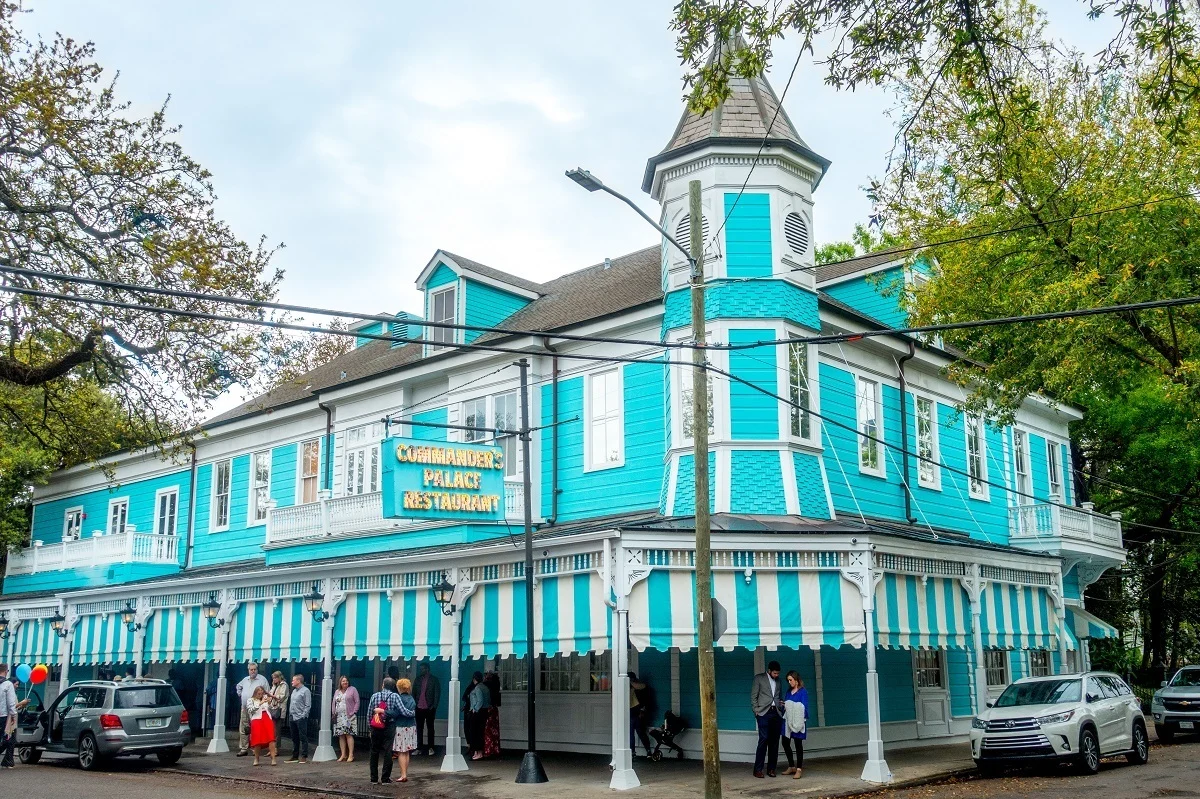 Turquoise and white striped exterior of Commander's Palace restaurant