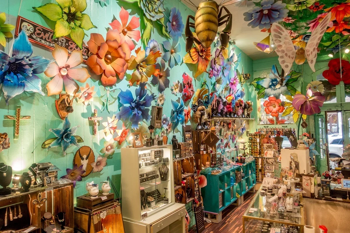 Jewelry and gift store with colorful interior and large flower decorations