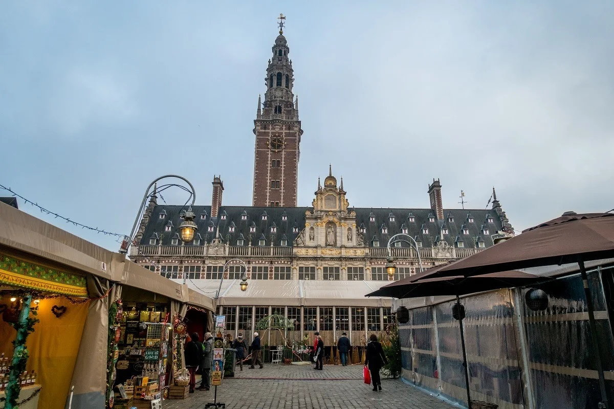 Market stalls in front of the large Leuven University library