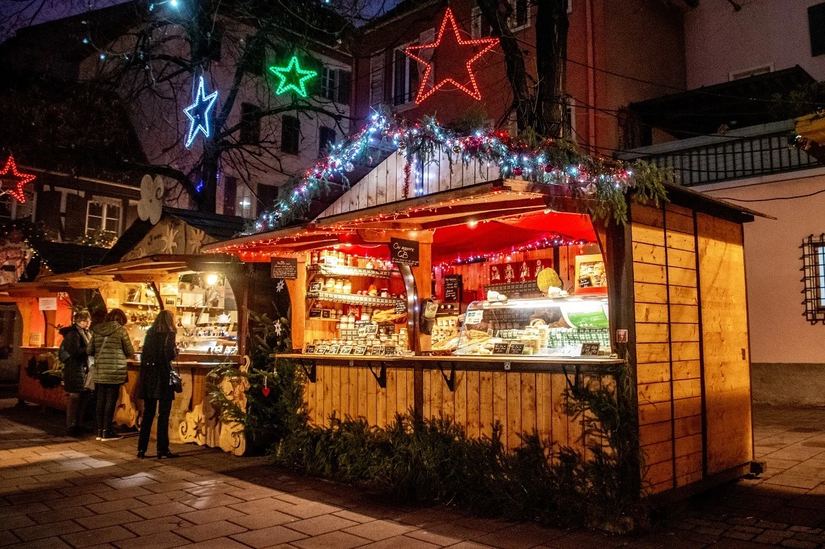 Vendor stall with Christmas lights. 