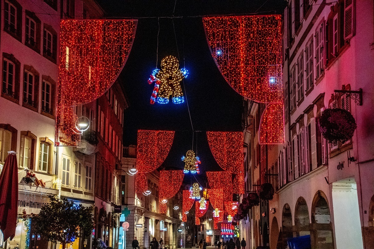 Gingerbread Christmas lights hanging across a street