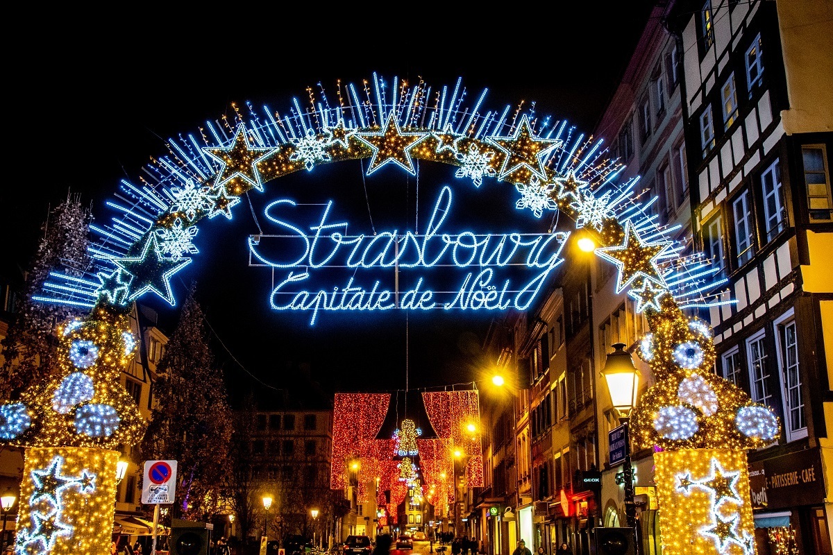 Colorful lights welcome visitors to the Strasbourg Christmas market in France