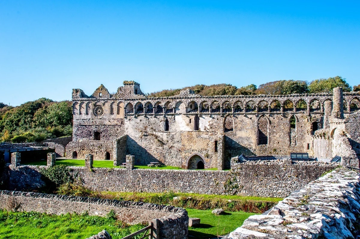 Ruins of a 14th-century stone palace with windows and walls