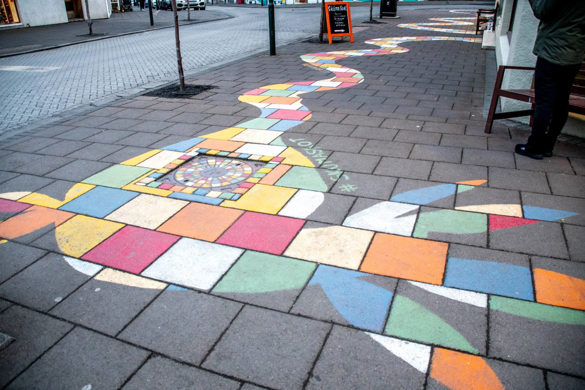Iceland arts are both colorful and playful, as can be seen in this sidewalk art