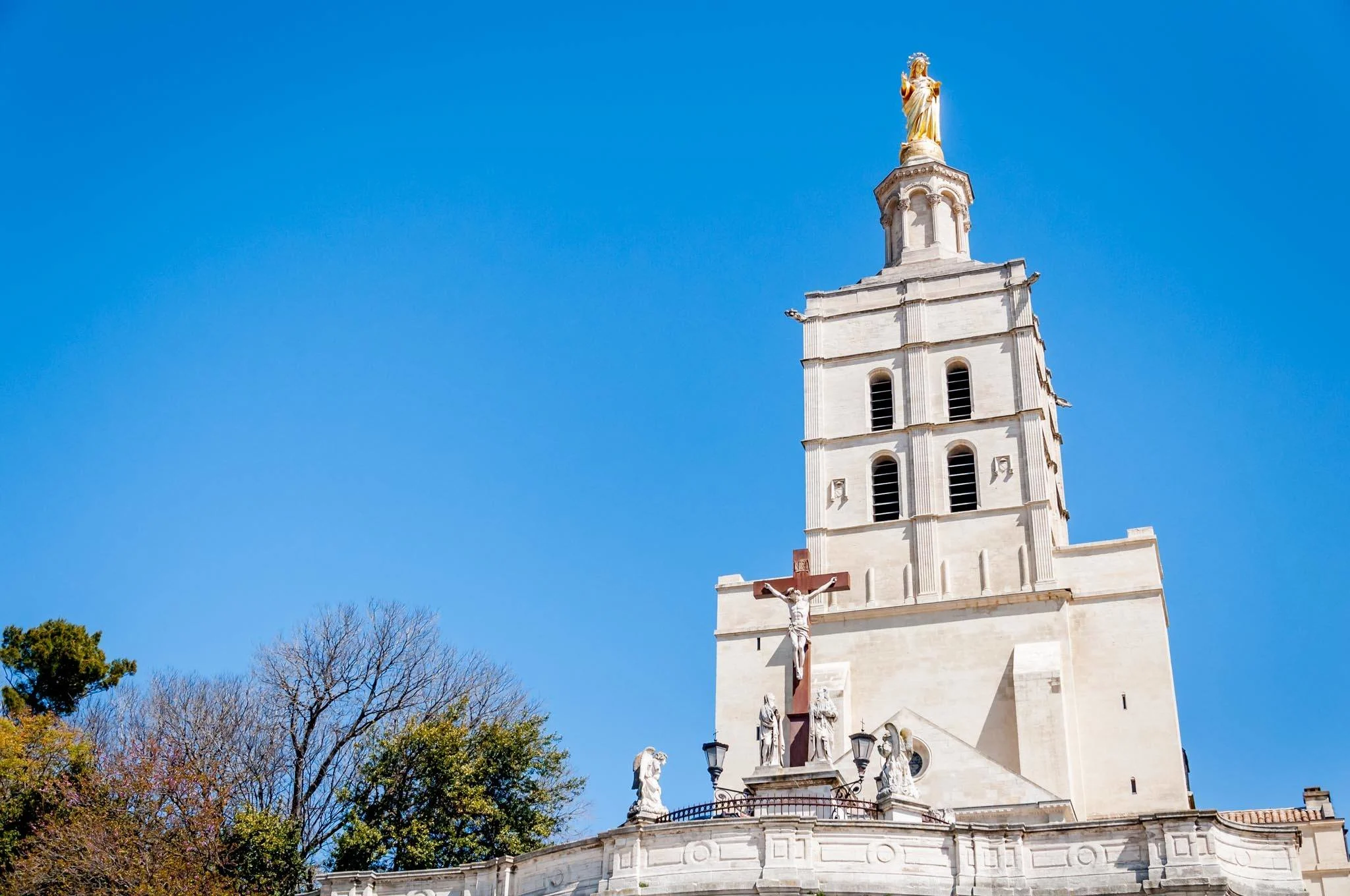 Avignon Cathedral bell tower topped with gold statue of Virgin Mary