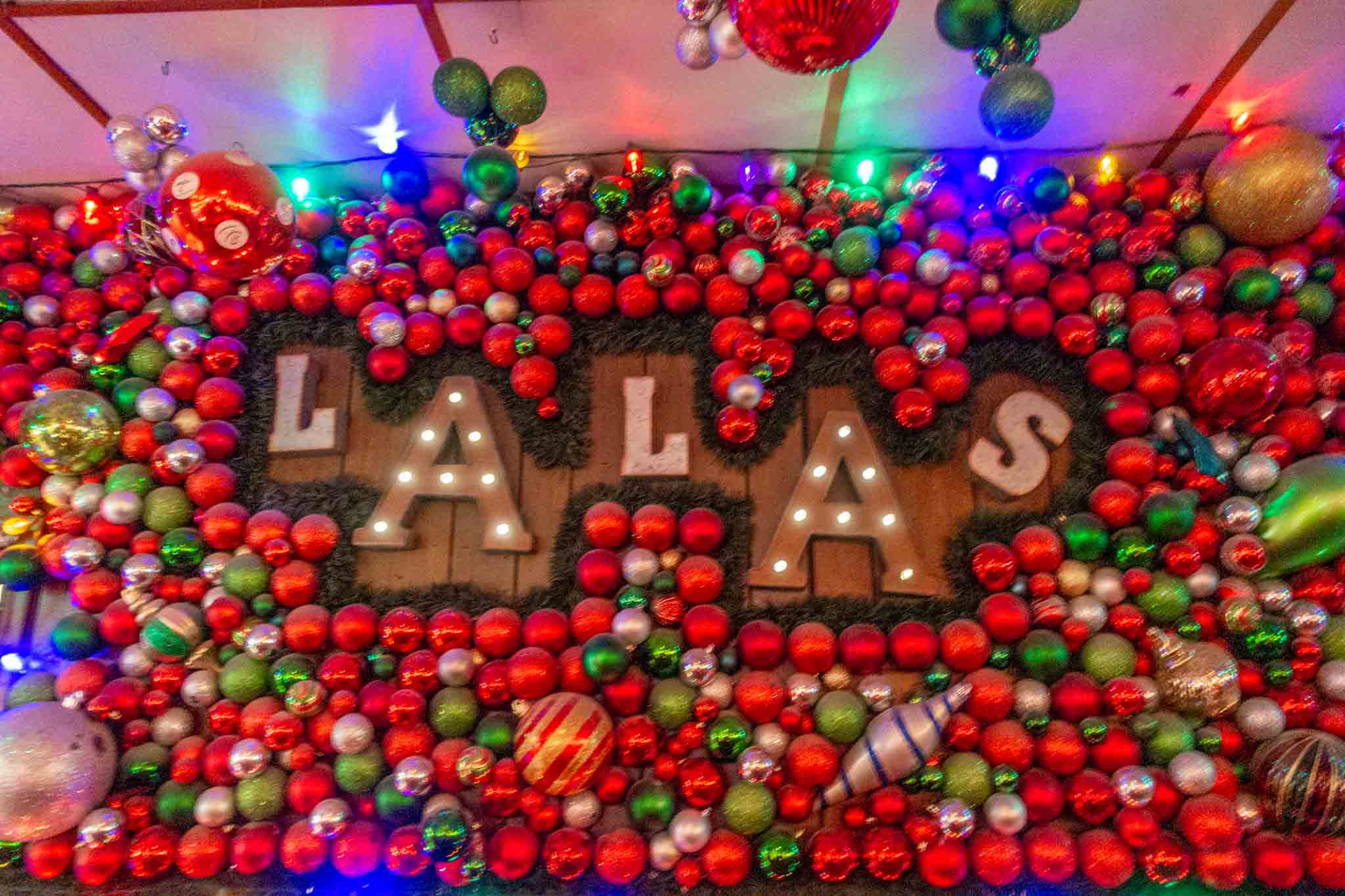 Lala's sign surrounded by Christmas ornaments