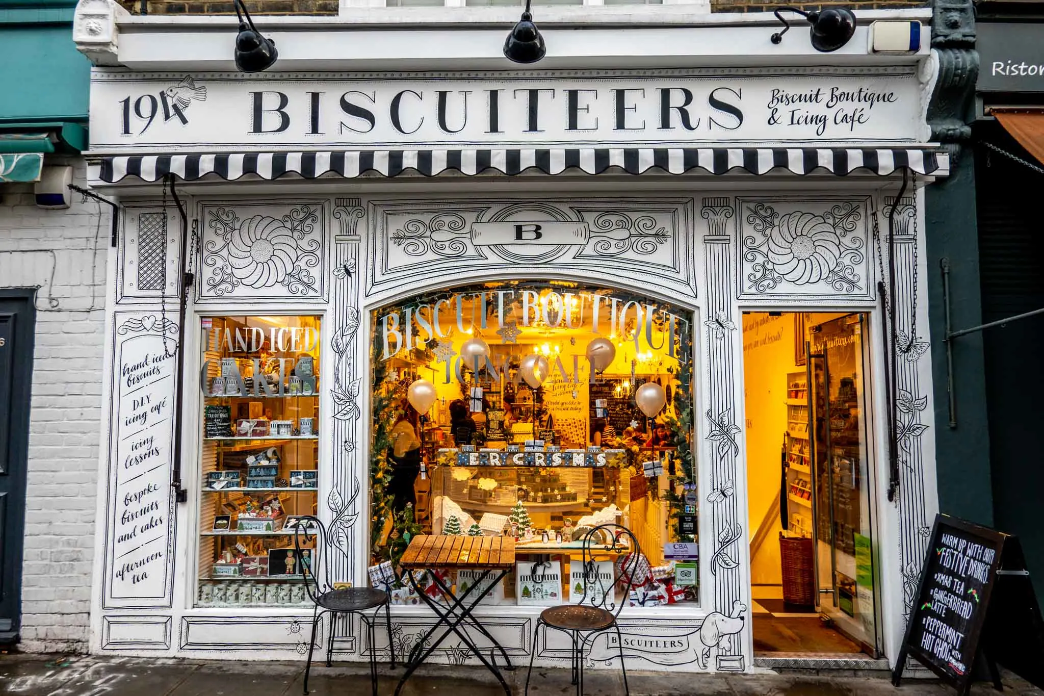 Black and white exterior of Biscuiteers cafe
