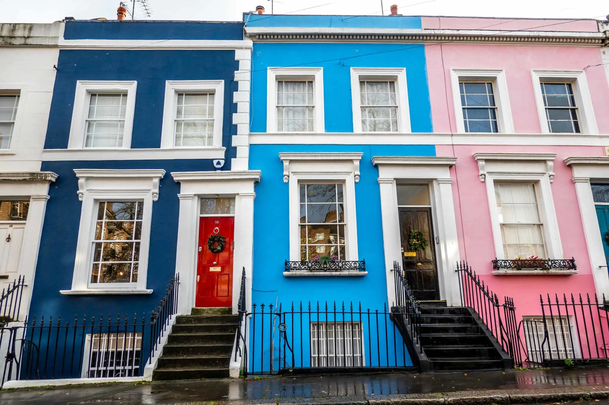 Blue and pink terrace homes in Notting Hill, London