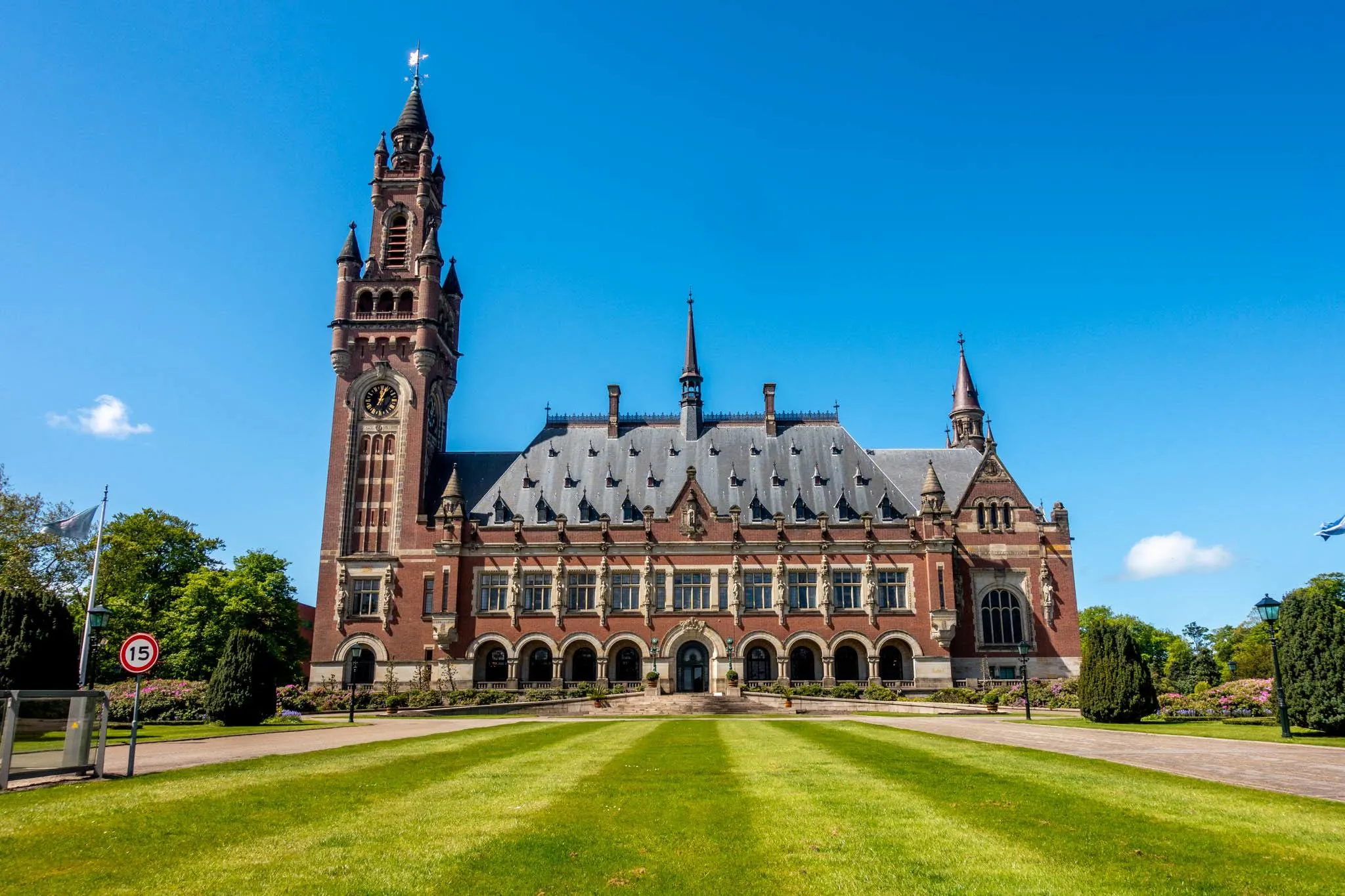 Large brick building with a clock tower, the Peace Palace in The Hague
