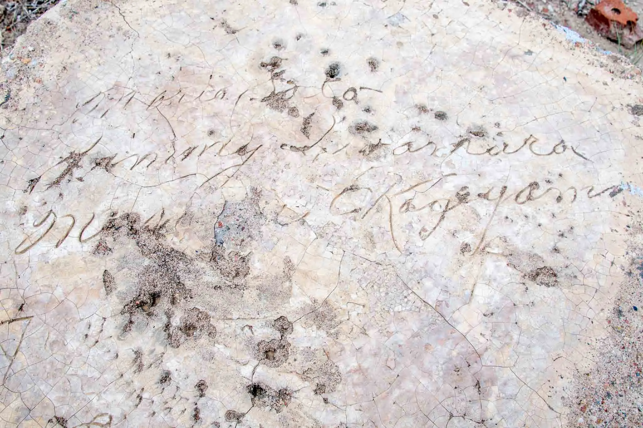 Names of prisoners signed into concrete at Camp Amache