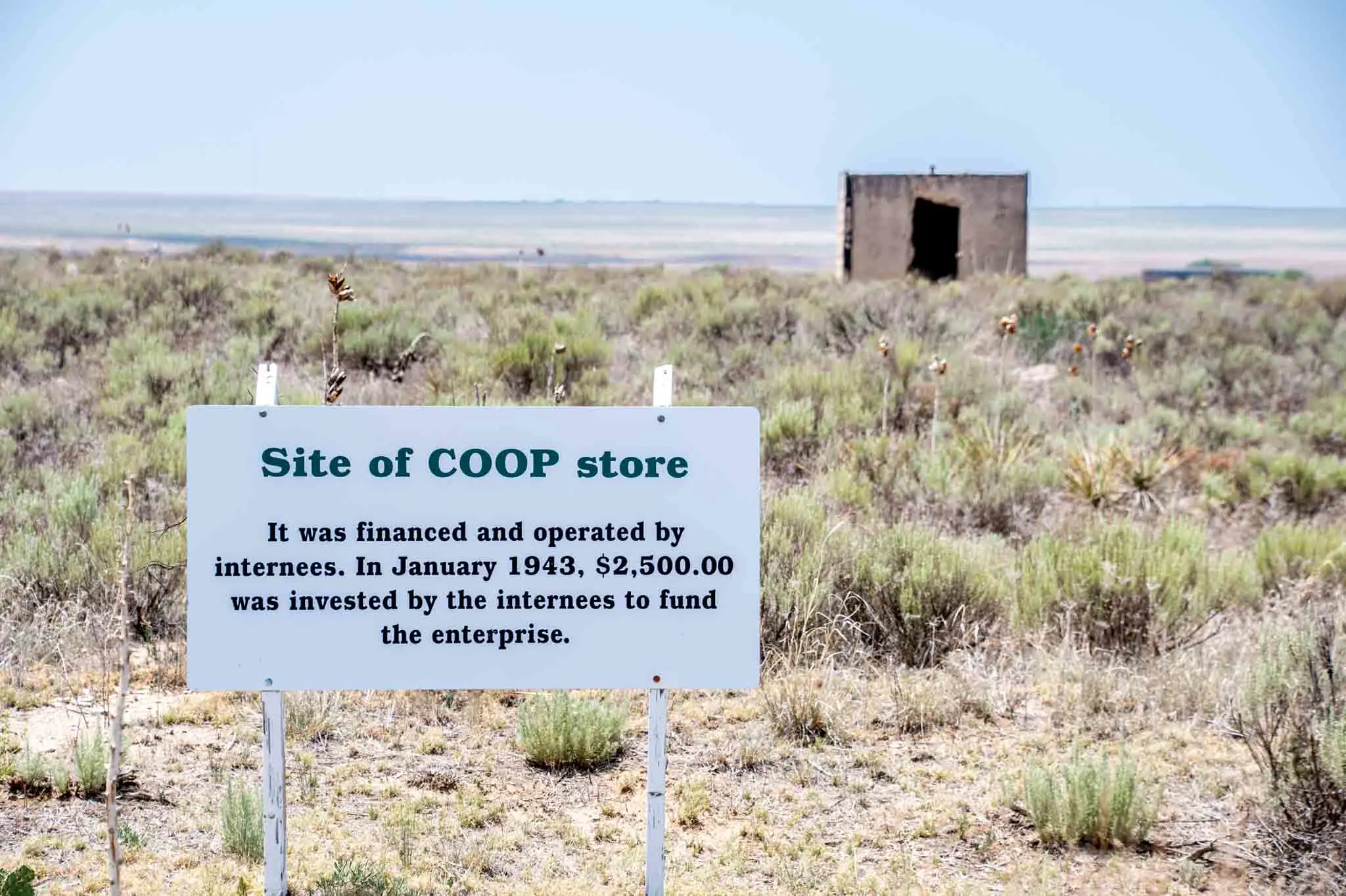 The coop storehouse and sign