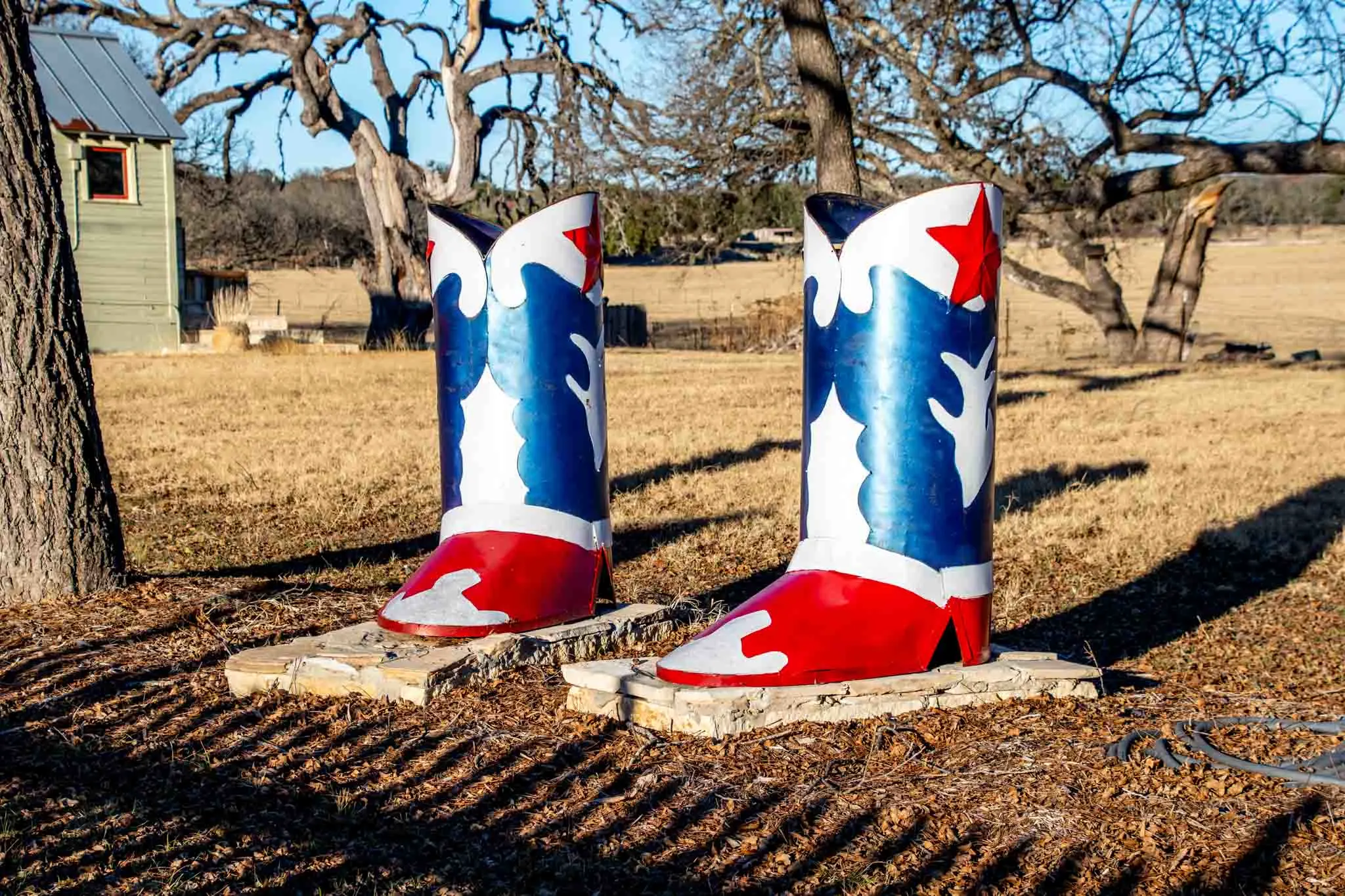 Large red, white, and blue cowboy boots