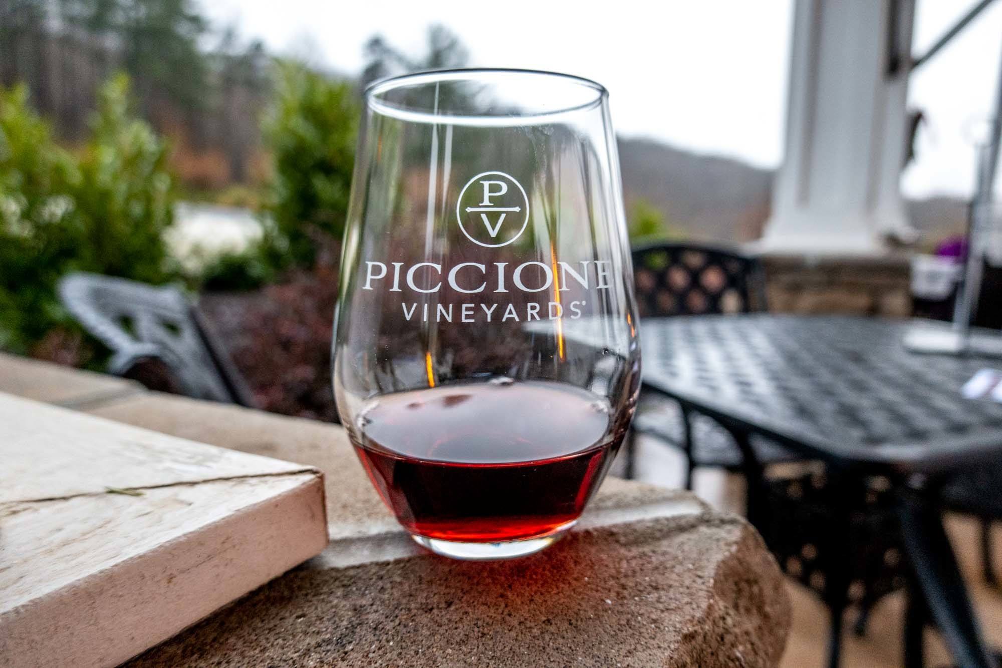 Wine glass labeled "Piccione Vineyards" 