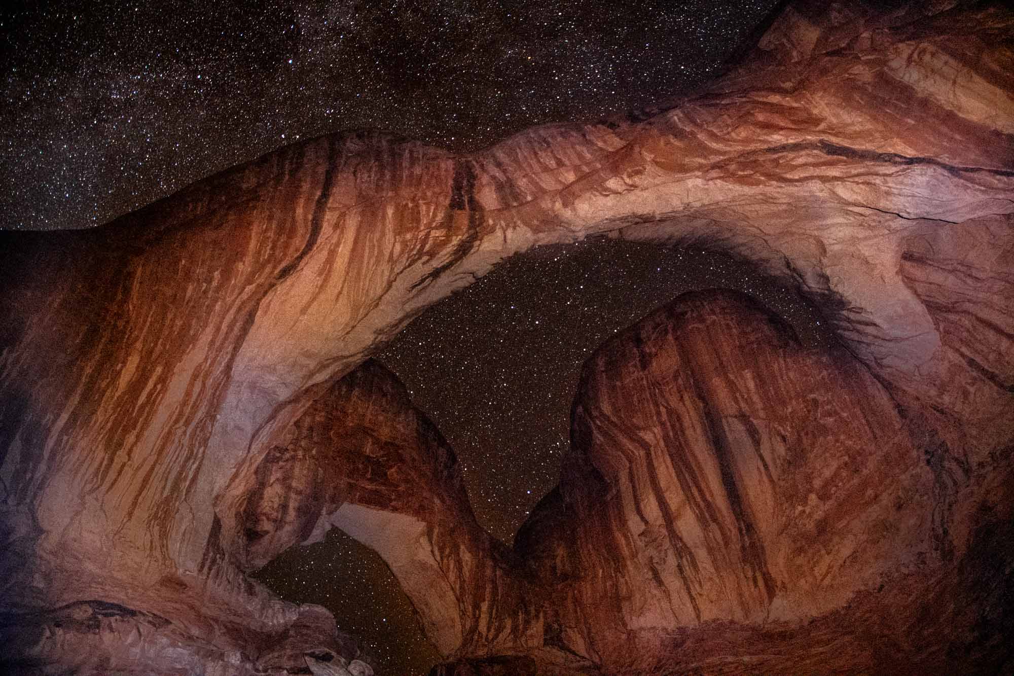 Stars above the Double Arch in Utah