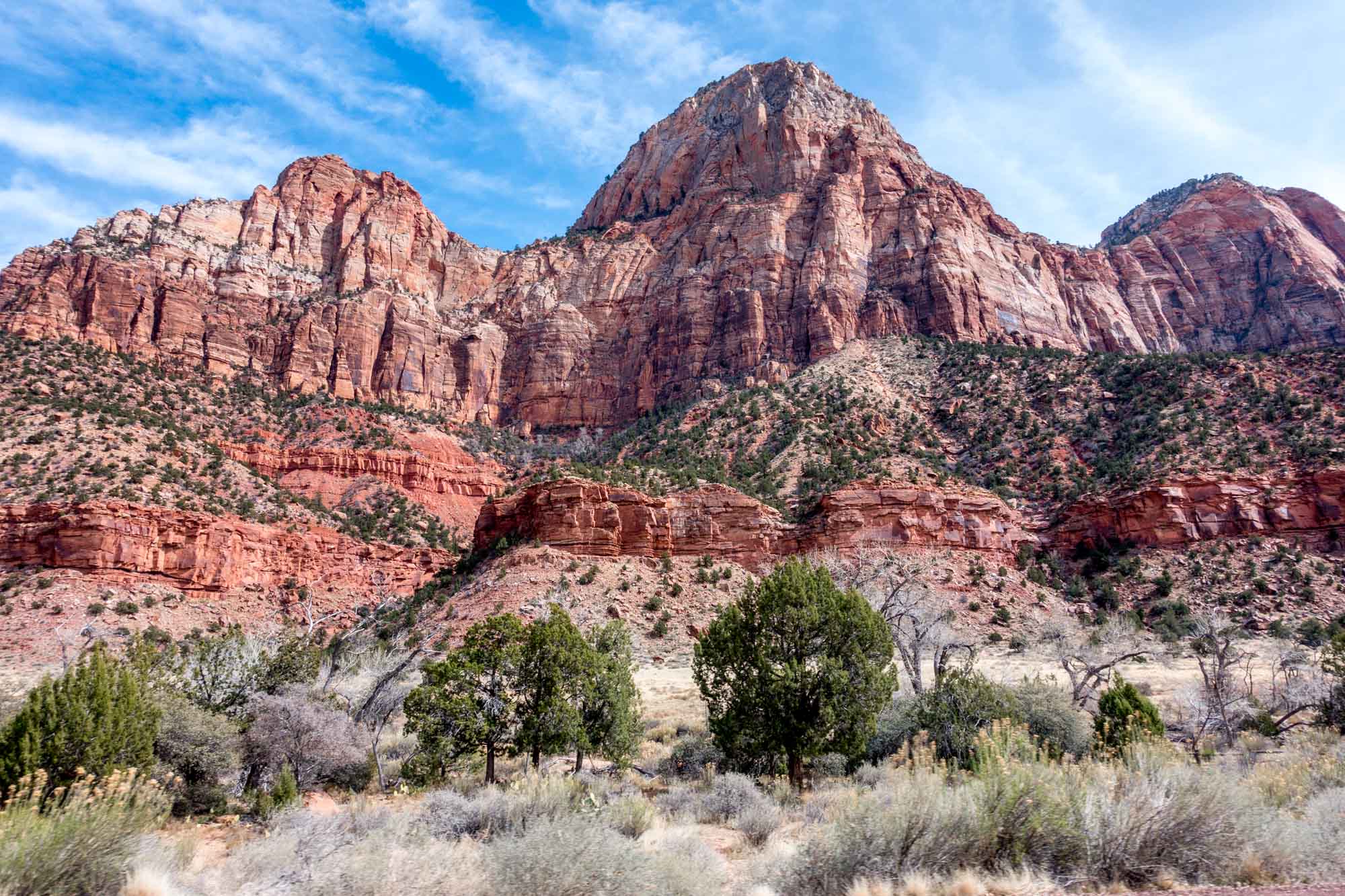 Red rock cliffs on side of mountain
