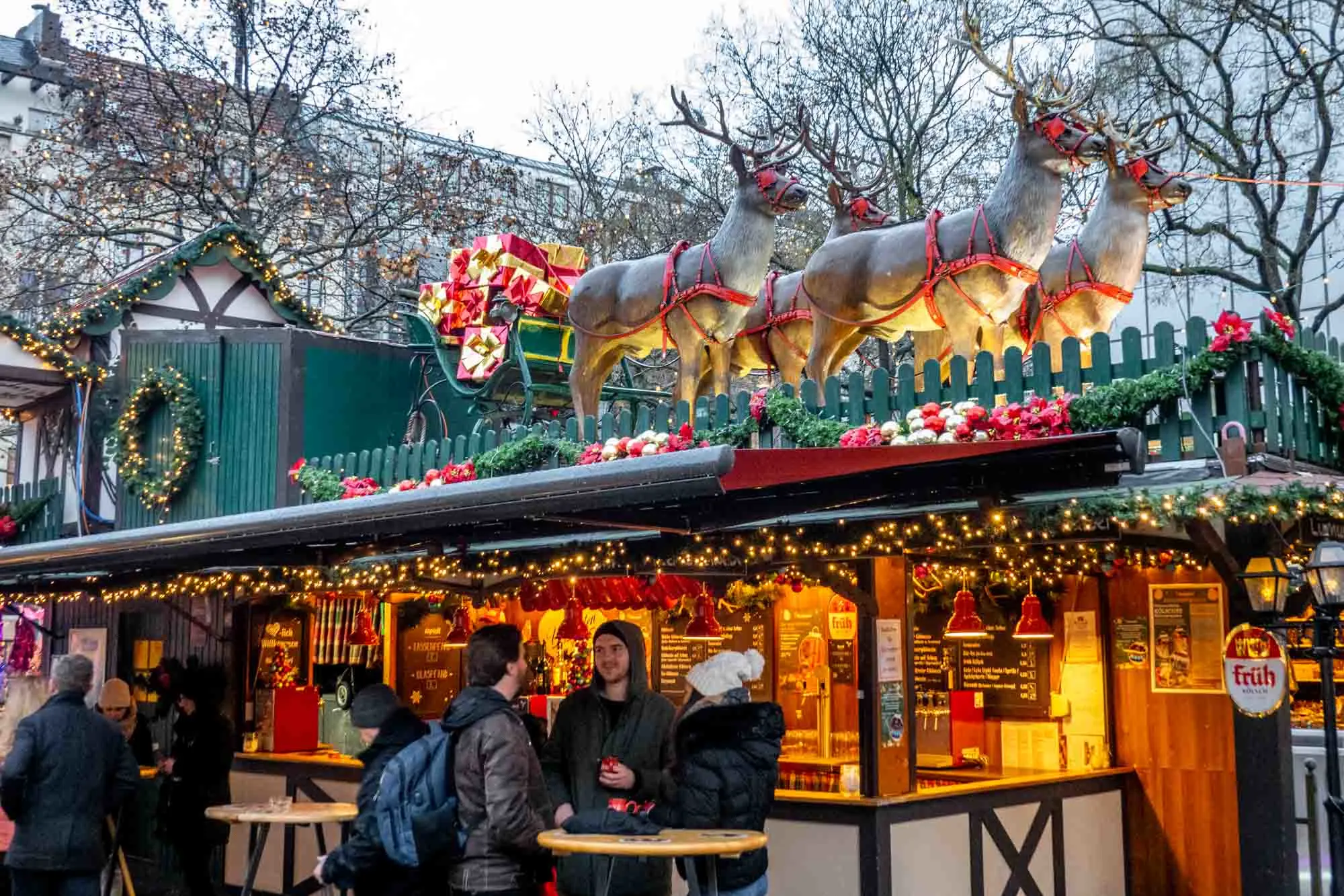Vendor stand topped with a sleigh and reindeer