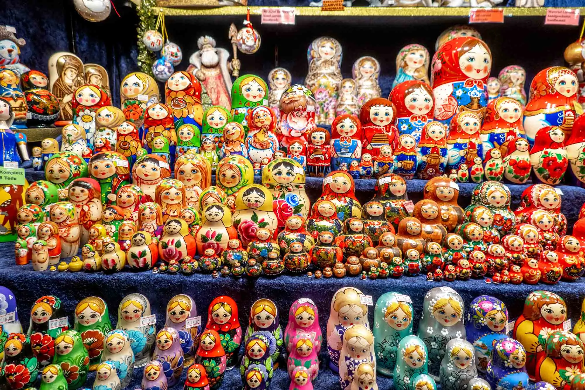 Rows of dolls in many colors of different sizes