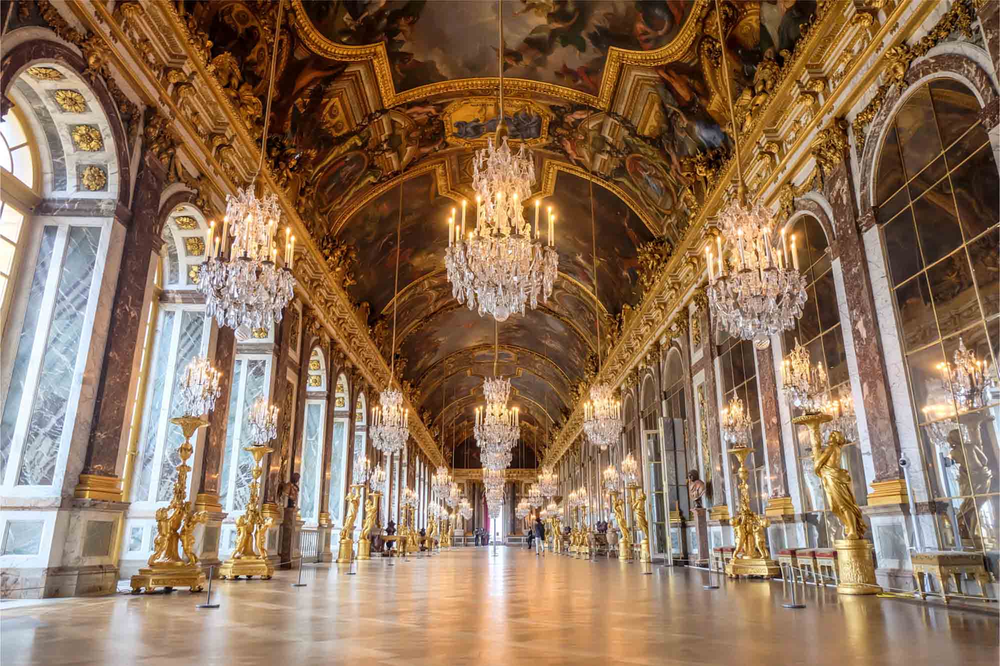 The ornate Hall of Mirrors in Versailles