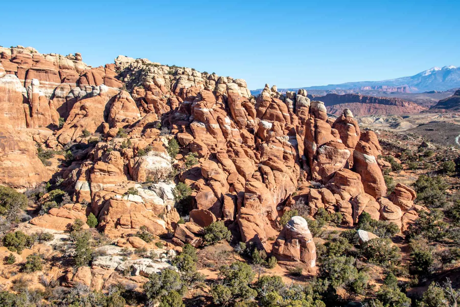 Red sandstone rock formations sticking up