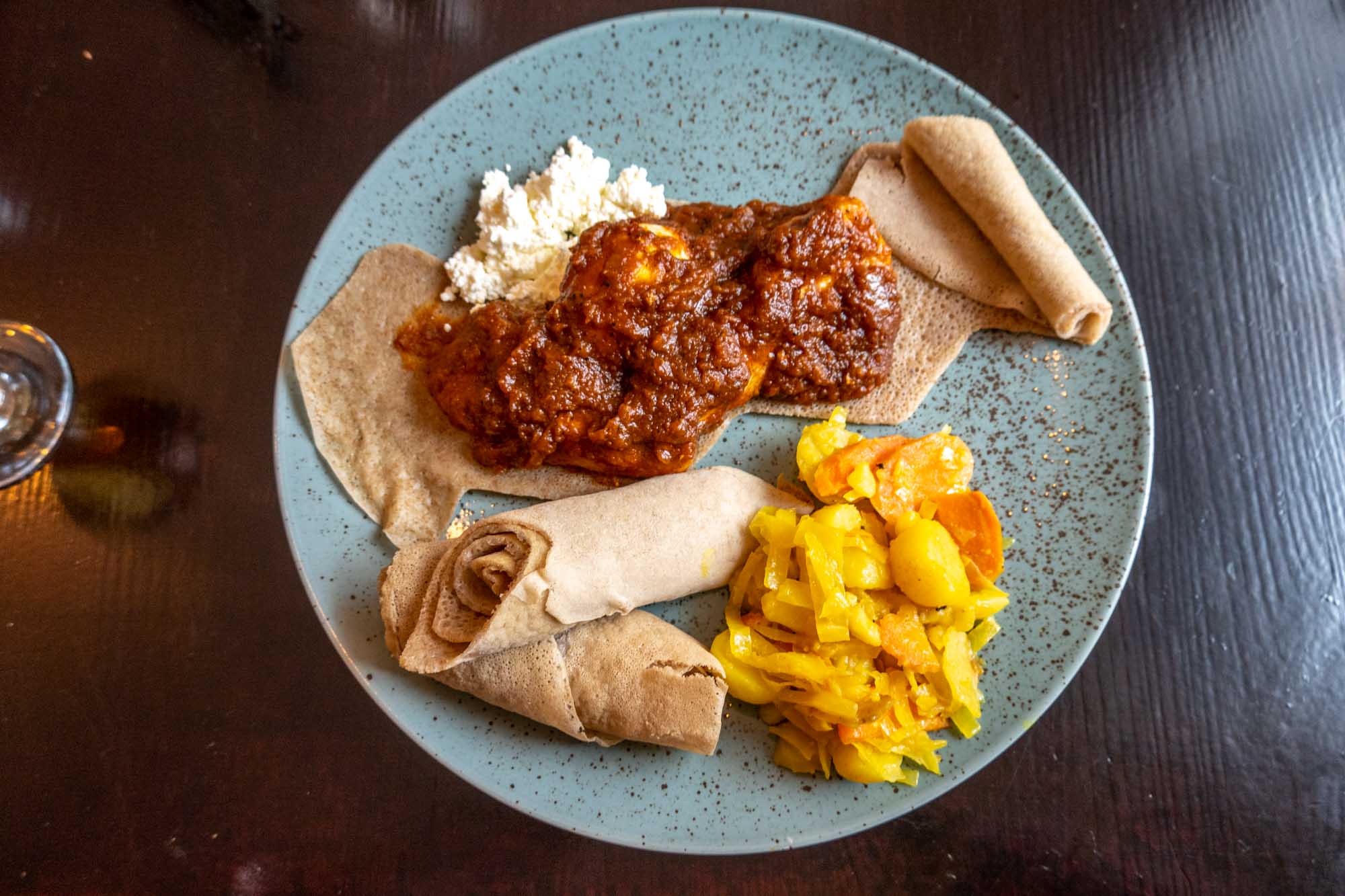 Plate of Ethiopian food, including the spongy bread